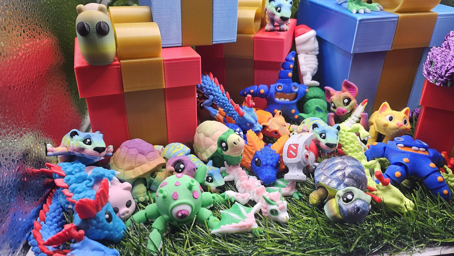 Cute and fun Mystery Gift Box of animals/critters from Sabre 3D, Matt Mire Makes, Artflex . Fidget Gifts