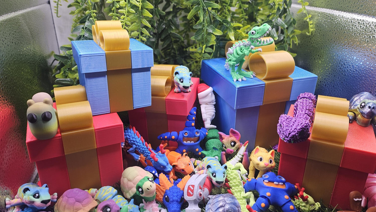 Cute and fun Mystery Gift Box of animals/critters from Sabre 3D, Matt Mire Makes, Artflex . Fidget Gifts